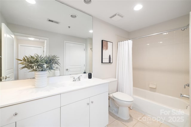 bathroom featuring tile patterned flooring, vanity, visible vents, and shower / tub combo with curtain