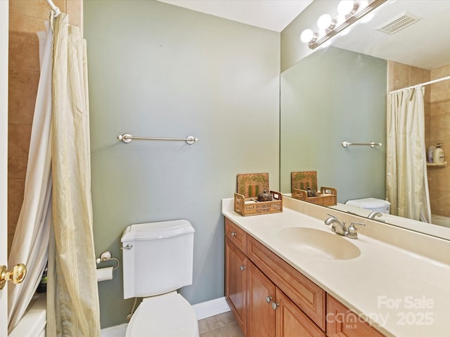 bathroom with tile patterned flooring, visible vents, toilet, and vanity