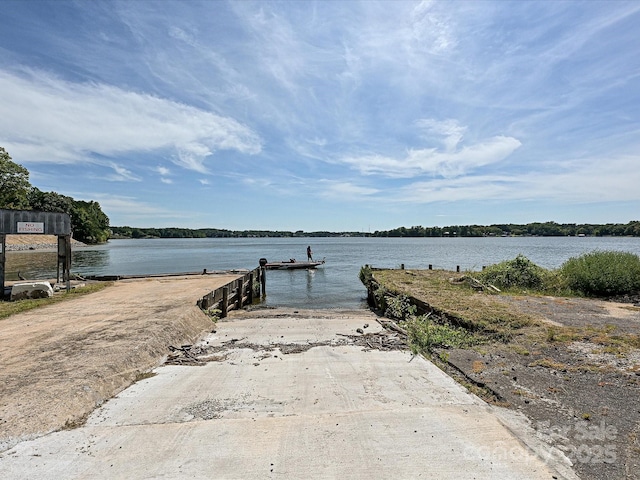 dock area featuring a water view