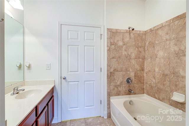 bathroom featuring vanity and shower / tub combination