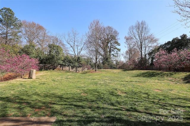 view of yard with fence