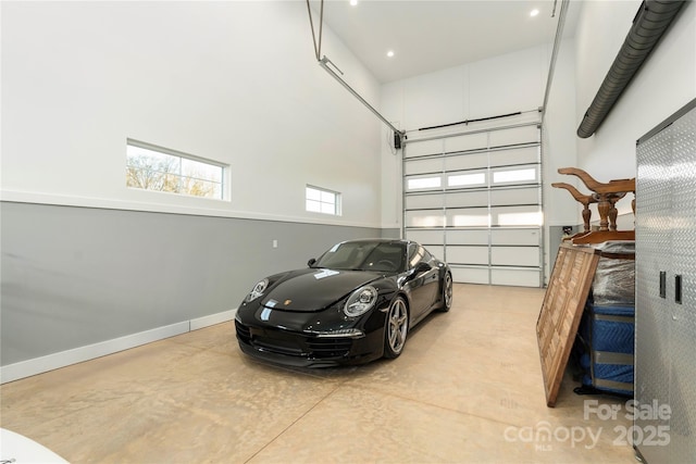 garage featuring baseboards