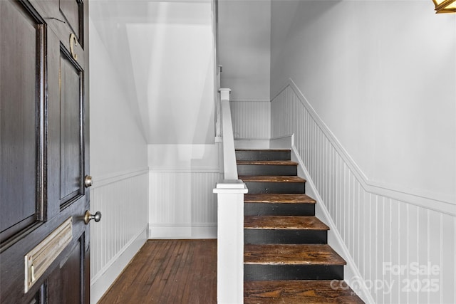 stairway featuring hardwood / wood-style flooring