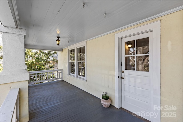 wooden deck with a porch