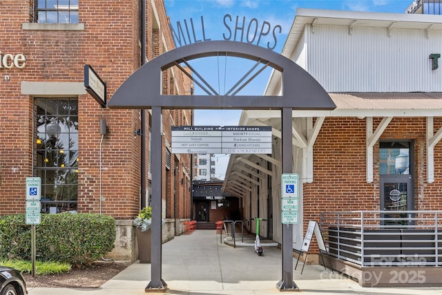 entrance to property with brick siding