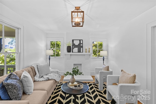 living room featuring a fireplace
