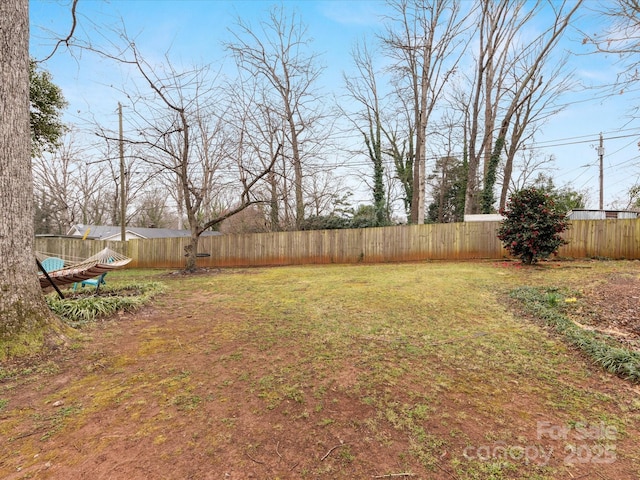 view of yard with fence