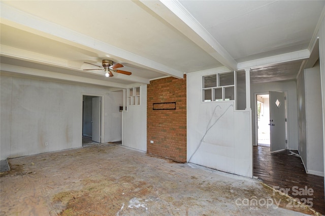 unfurnished room with beam ceiling, crown molding, and a ceiling fan