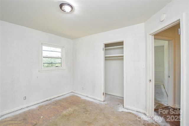 unfurnished bedroom with a closet