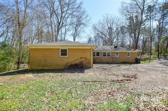 back of property with brick siding