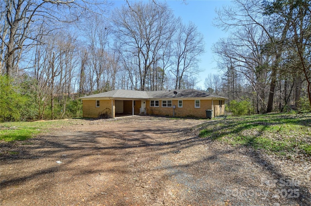 view of front of property featuring brick siding