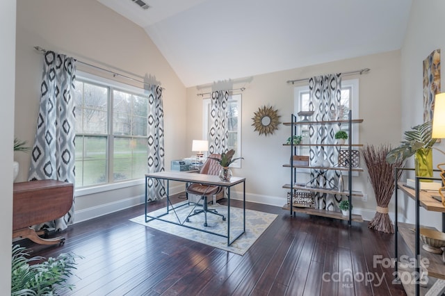 office with baseboards, lofted ceiling, and wood-type flooring