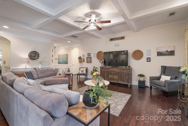 living area with visible vents, coffered ceiling, dark wood finished floors, beam ceiling, and arched walkways