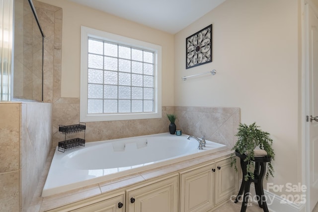 full bath featuring a tile shower and a garden tub