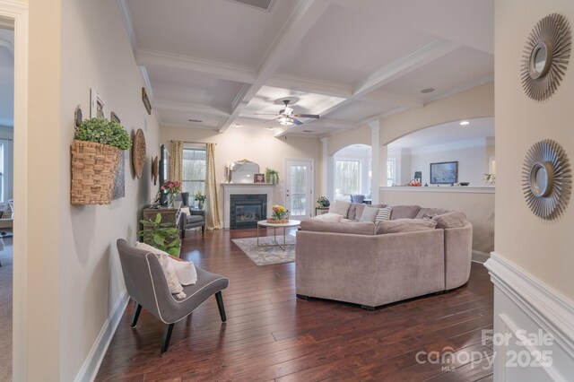 303 Ridge Reserve Dr Unit 29, Clover, SC 29710 - living area with beam ceiling, healthy amount of natural light, dark wood finished floors, coffered ceiling, and crown molding