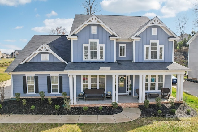 view of front of property featuring covered porch and board and batten siding