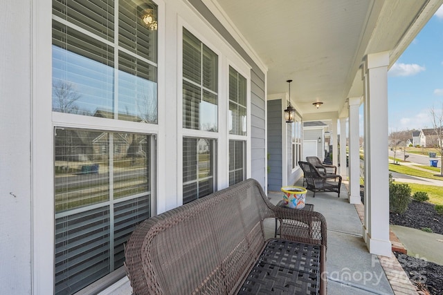 view of patio featuring a porch