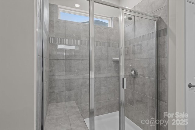 full bath featuring a stall shower