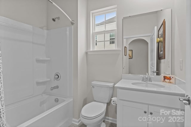 bathroom featuring shower / bath combination, baseboards, toilet, and vanity