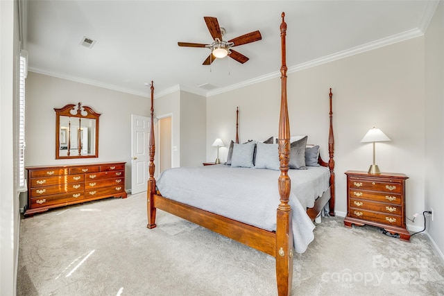 bedroom featuring visible vents, ornamental molding, baseboards, and carpet floors