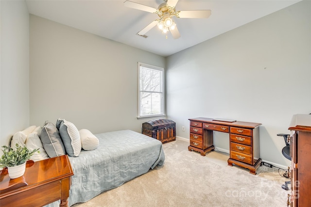 bedroom with light carpet, visible vents, a ceiling fan, and baseboards