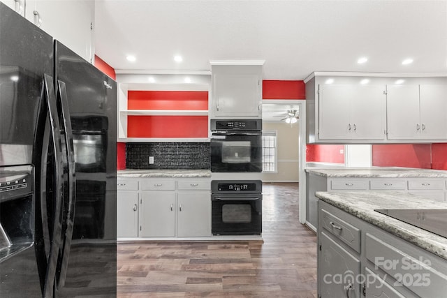 kitchen with black appliances, light wood-style flooring, a ceiling fan, open shelves, and tasteful backsplash