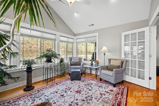 living area with visible vents, high vaulted ceiling, a ceiling fan, wood finished floors, and recessed lighting