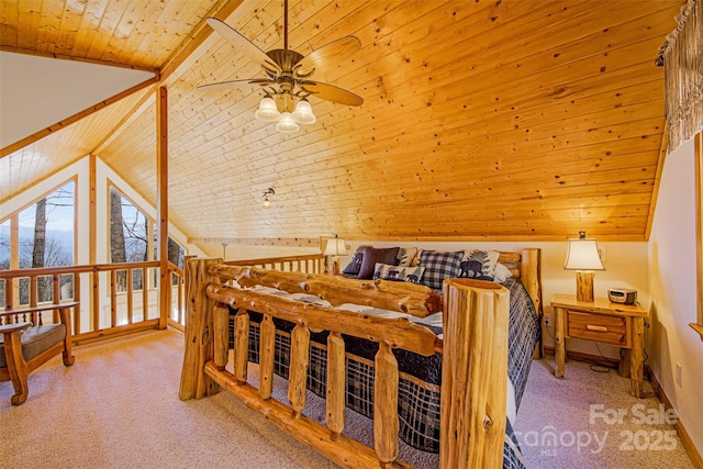 bedroom with carpet floors, wooden ceiling, and vaulted ceiling