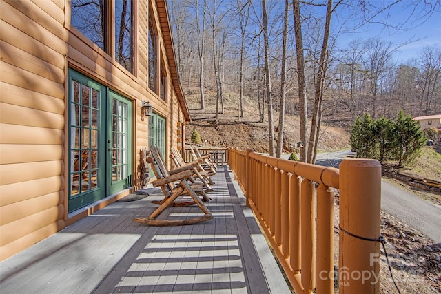 wooden terrace featuring french doors