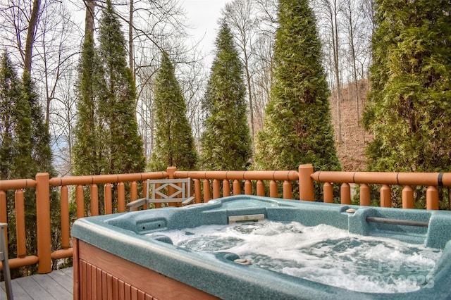 deck featuring a hot tub