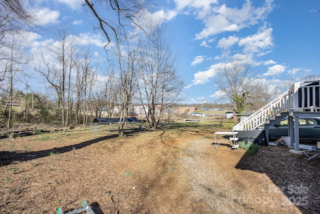 view of yard featuring stairs