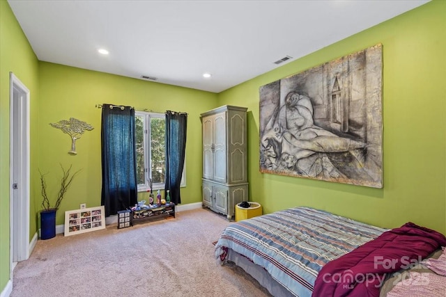 bedroom featuring visible vents, baseboards, and carpet floors