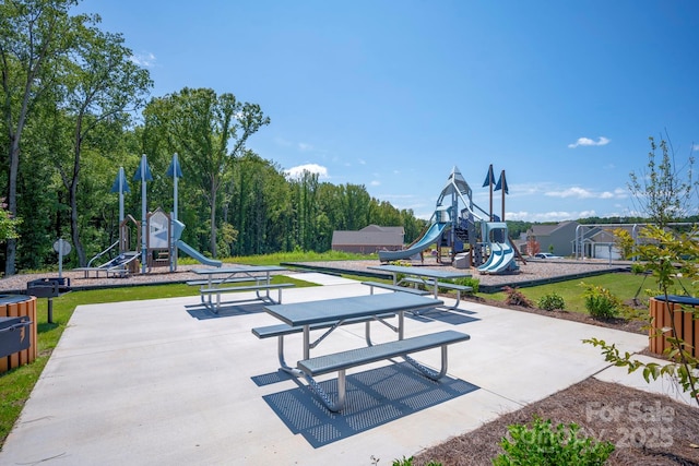 view of property's community featuring playground community