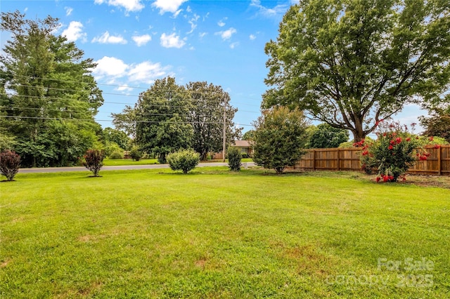 view of yard featuring fence