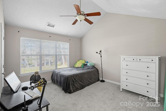 bedroom with baseboards, visible vents, vaulted ceiling, a textured ceiling, and carpet flooring