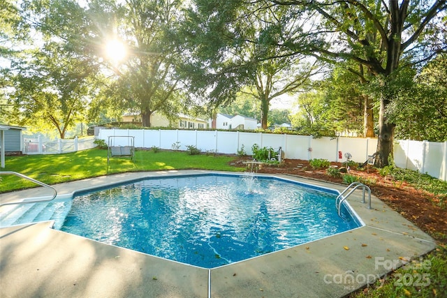 view of pool featuring a fenced in pool, a lawn, and a fenced backyard