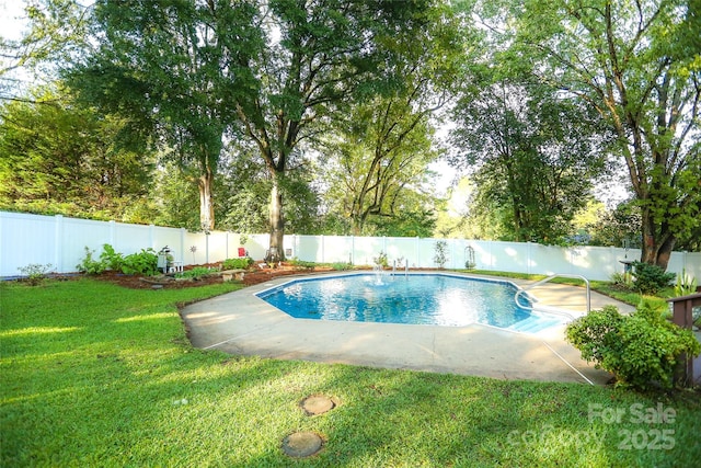 view of pool featuring a yard, a fenced in pool, a patio, and a fenced backyard