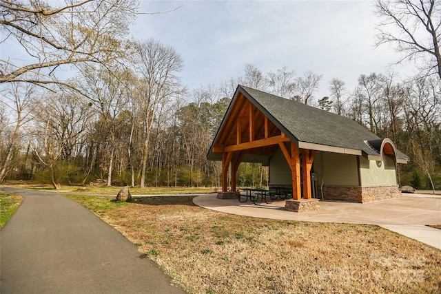 view of home's community featuring a gazebo and a yard