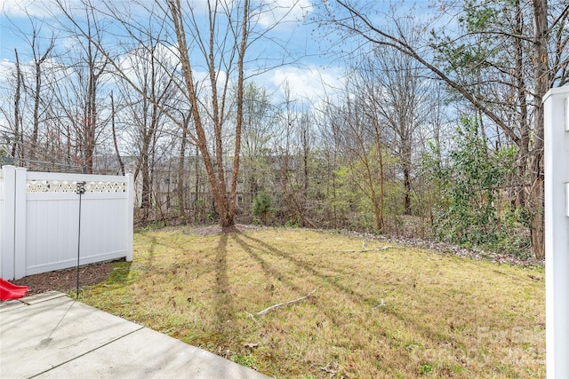 view of yard featuring fence