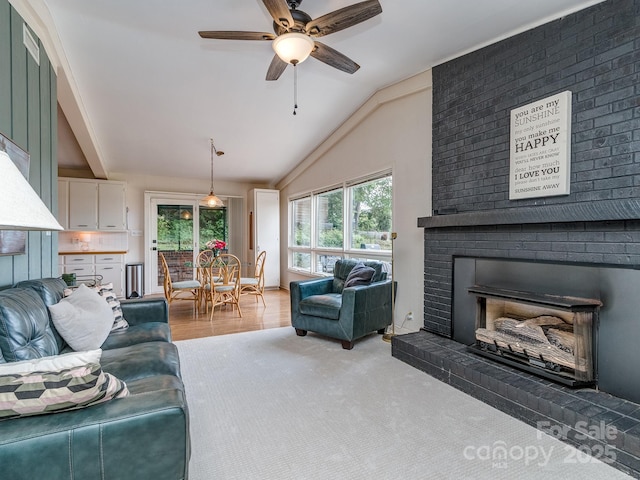 109 Joe Teague Rd, Hickory, NC 28601 - living area with a fireplace, lofted ceiling, and ceiling fan