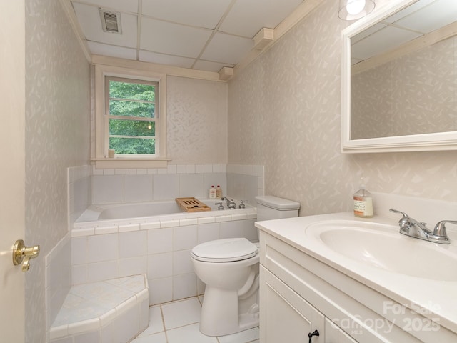 109 Joe Teague Rd, Hickory, NC 28601 - bathroom featuring toilet, tiled bath, wallpapered walls, vanity, and tile patterned flooring
