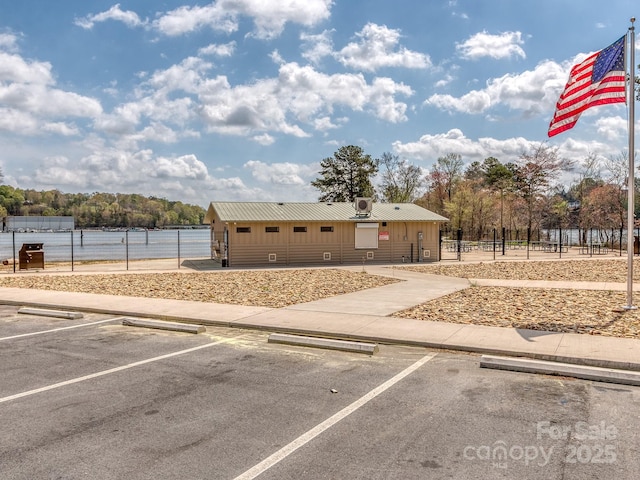 109 Joe Teague Rd, Hickory, NC 28601 - view of front facade with uncovered parking, fence, and metal roof