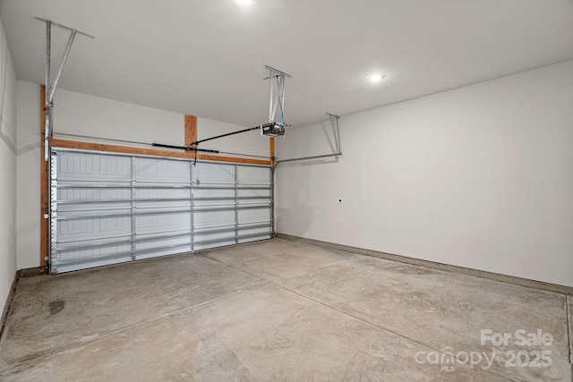 garage featuring a garage door opener