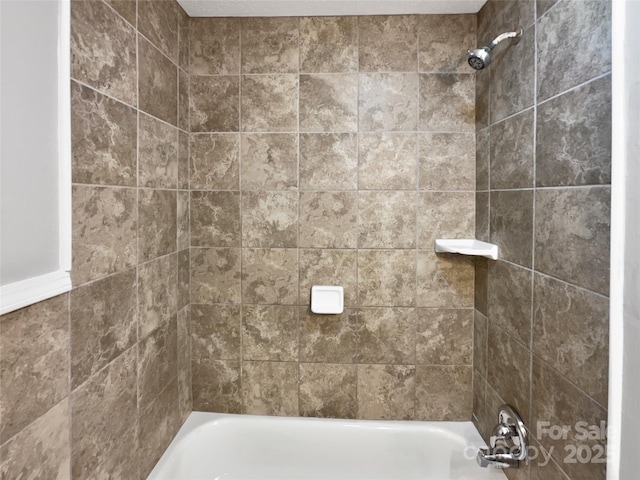 full bath featuring shower / bathing tub combination