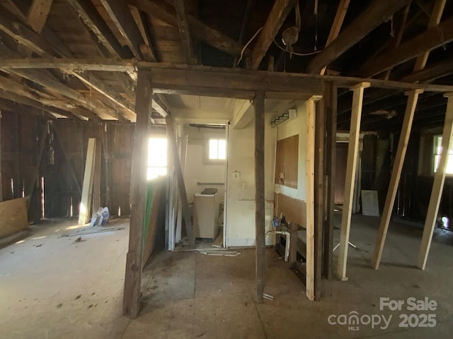 misc room featuring washer / dryer