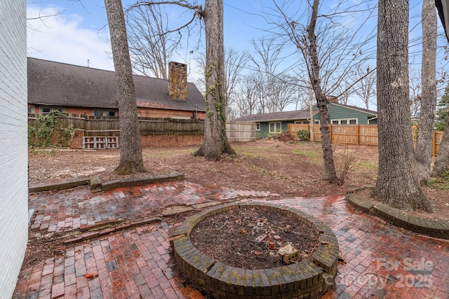 view of yard featuring a fenced backyard and a patio area