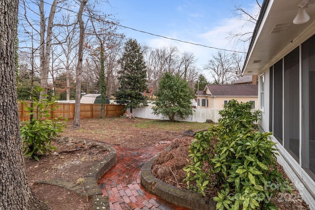 view of yard featuring a fenced backyard