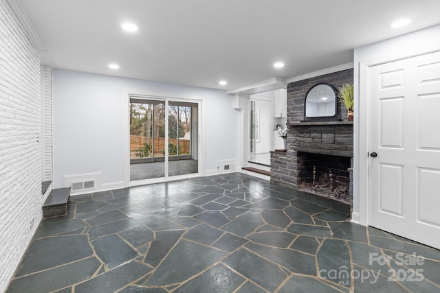 living room featuring recessed lighting, visible vents, baseboards, and a fireplace