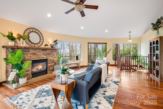 830 Fortescue Rd, Zirconia, NC 28790 - living room with wood finished floors, a fireplace, recessed lighting, and ceiling fan