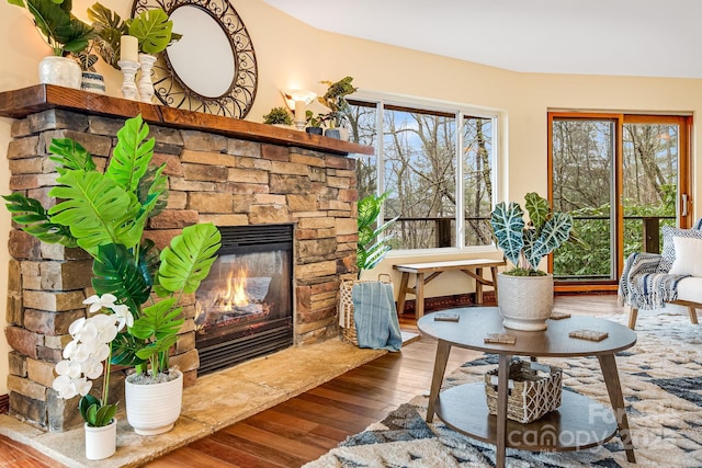 830 Fortescue Rd, Zirconia, NC 28790 - sitting room with hardwood / wood-style floors, a wealth of natural light, and a fireplace